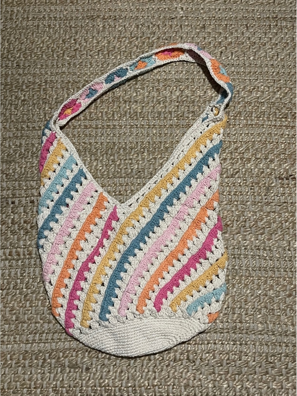 Handmade crochet hobo-style shoulder bag